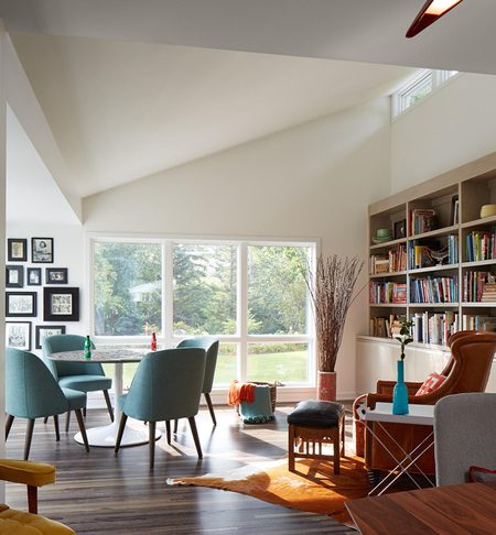 Designer puts Ã«boho-modernÃ­ spin on her midcentury rambler in Edina The sunroom was updated with paint, refinished floors and teal furniture. (Susan Gilmore/Minneapolis Star Tribune/TNS)